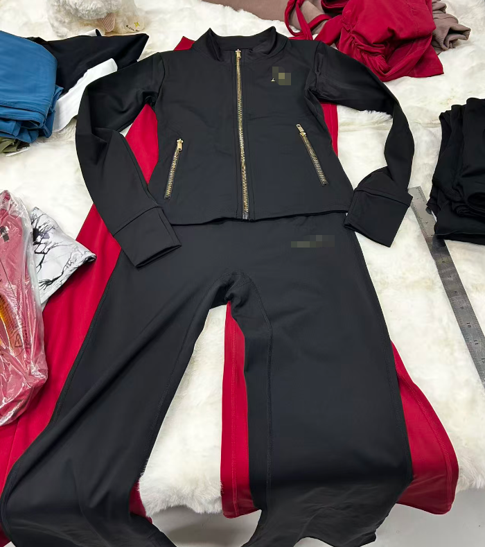 Approved tech pack beside a finished activewear sample and material references